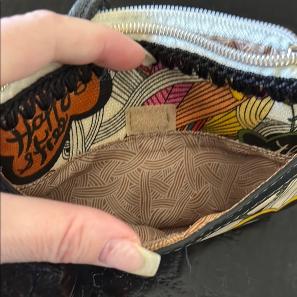 The Sak Vibrant Black and Orange Artistic Clutch Wristlet - Picture 3 of 5